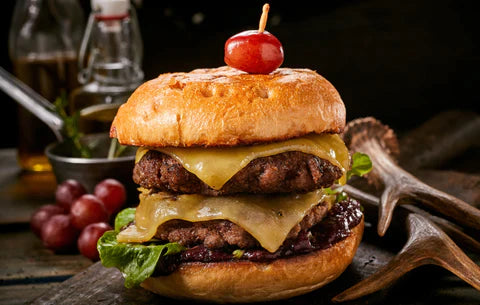 http://www.bradleysmoker.com/cdn/shop/articles/HOW_TO_SMOKE_THE_ULTIMATE_VENISON_BURGER.webp?v=1675738990